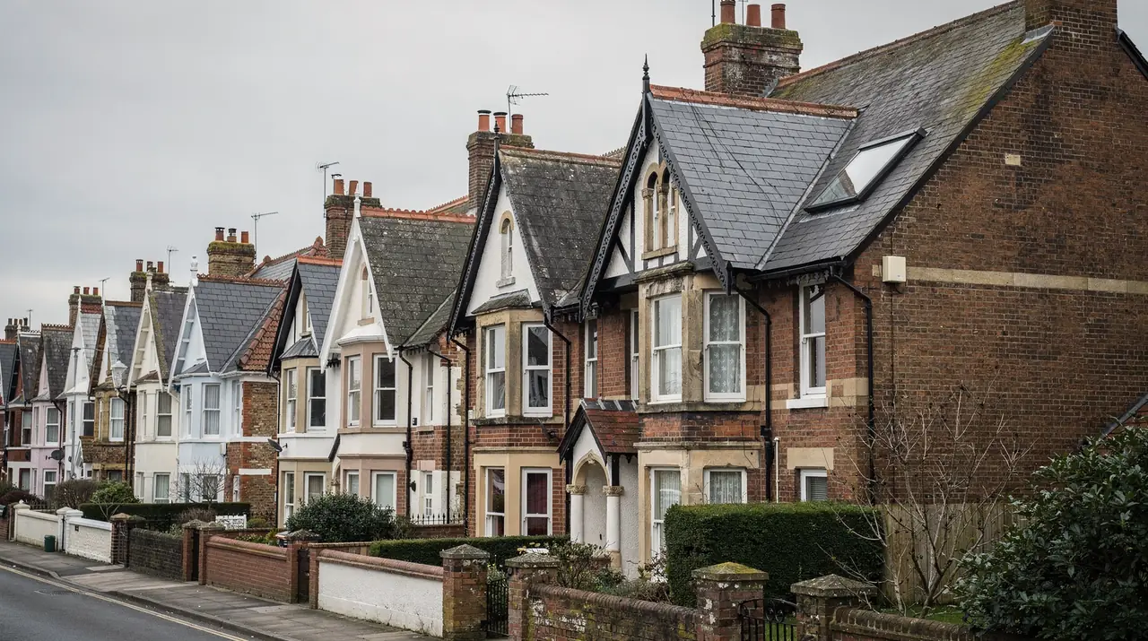 Street of Victorian gabled houses with slate roofs