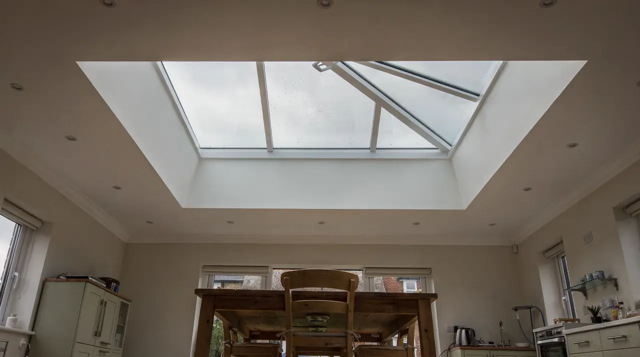 Roof lantern above a dining table in a kitchen extension